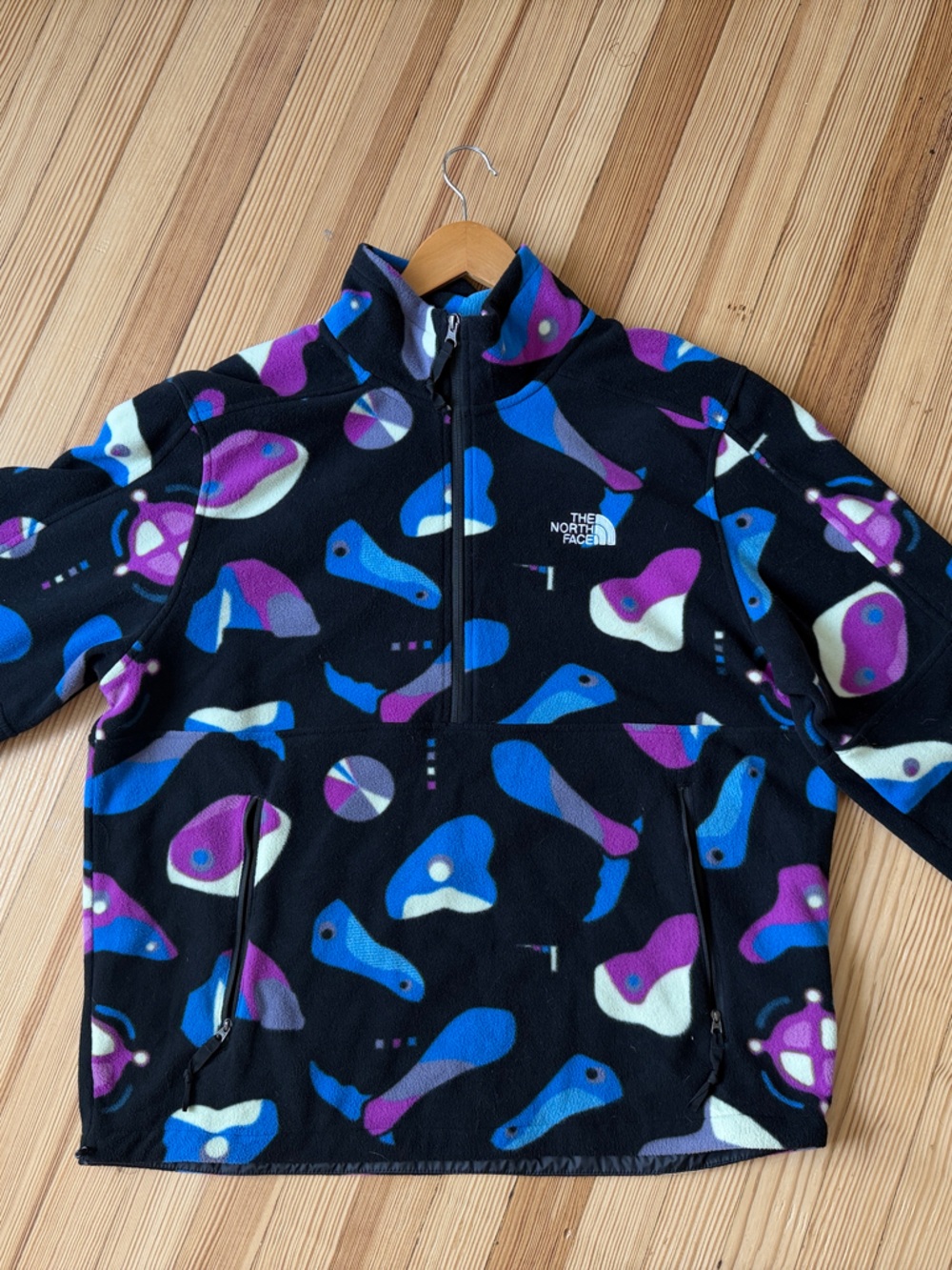 The North Face Kids Black Fleece Jacket with Blue, Purple & White Pattern